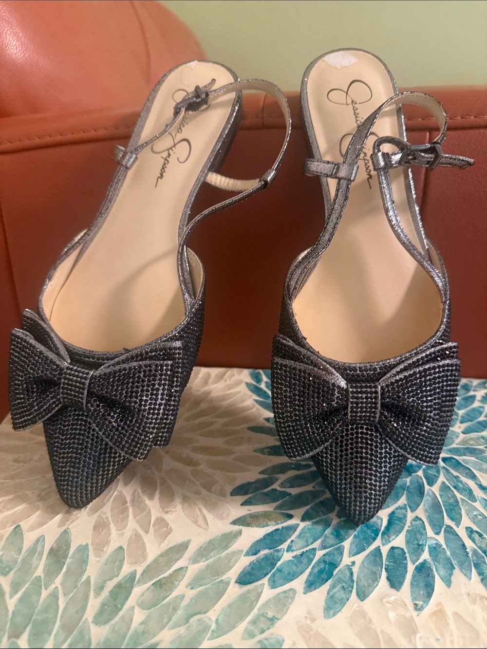 Caparros Metallic Silver Pointed Slingback Pumps with Rhinestone Bow